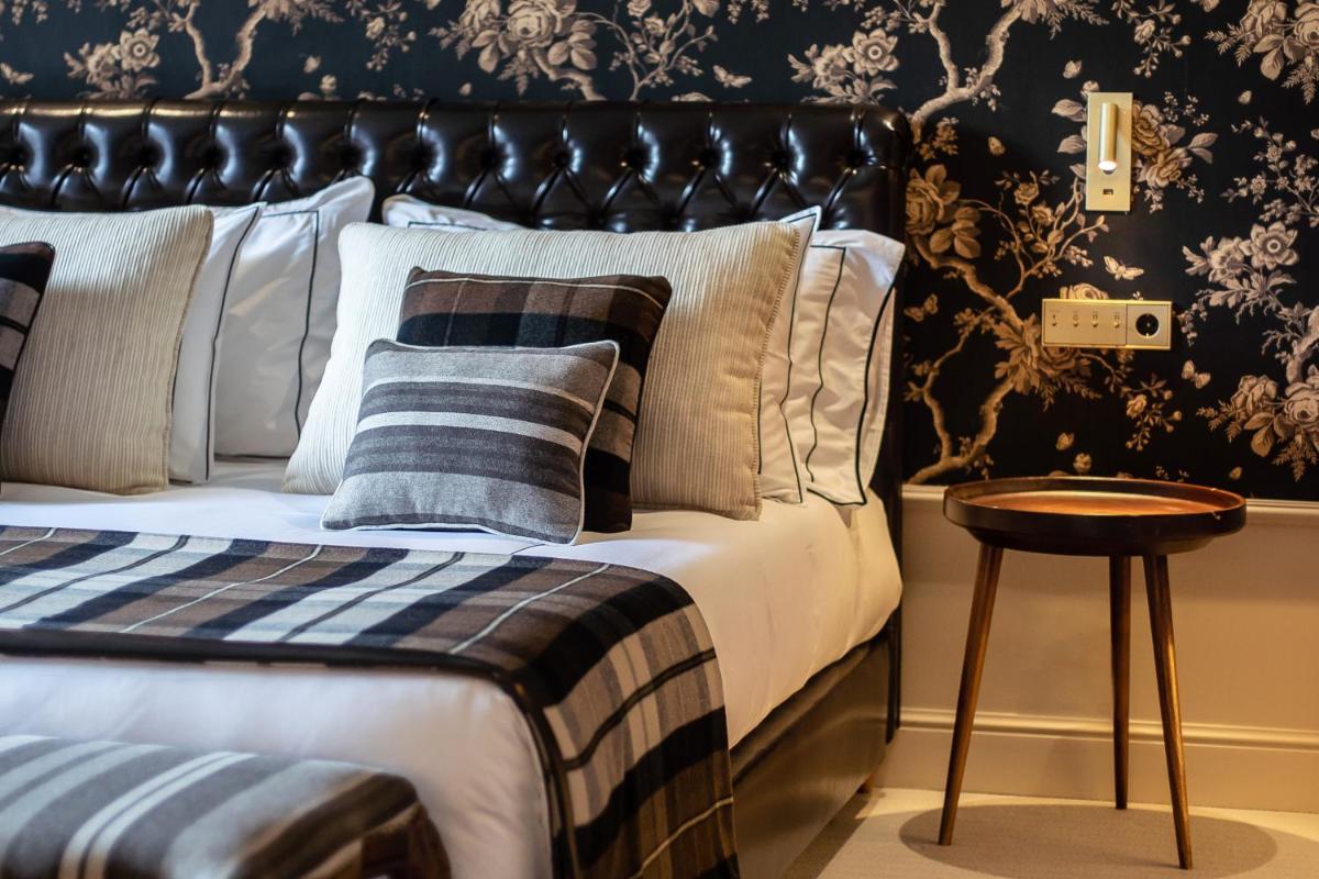 Uma cama ou camas num quarto em Vinha Boutique Hotel - The Leading Hotels of the World