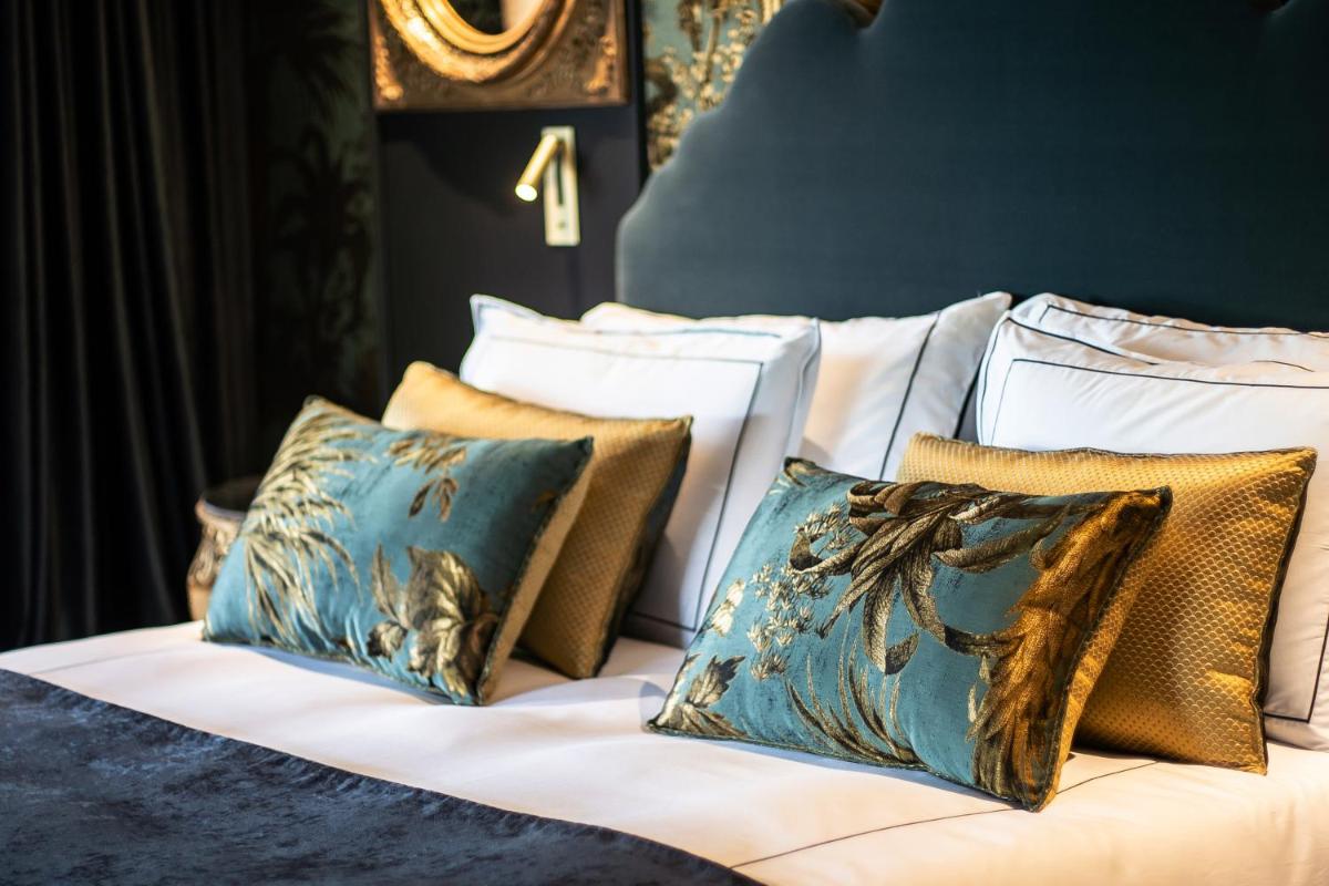 Uma cama ou camas num quarto em Vinha Boutique Hotel - The Leading Hotels of the World