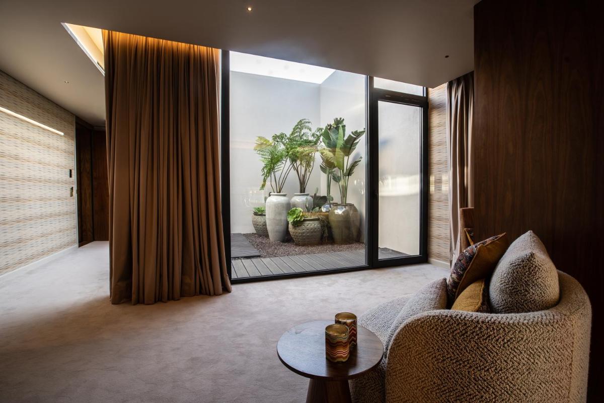 Uma área de estar em Vinha Boutique Hotel - The Leading Hotels of the World