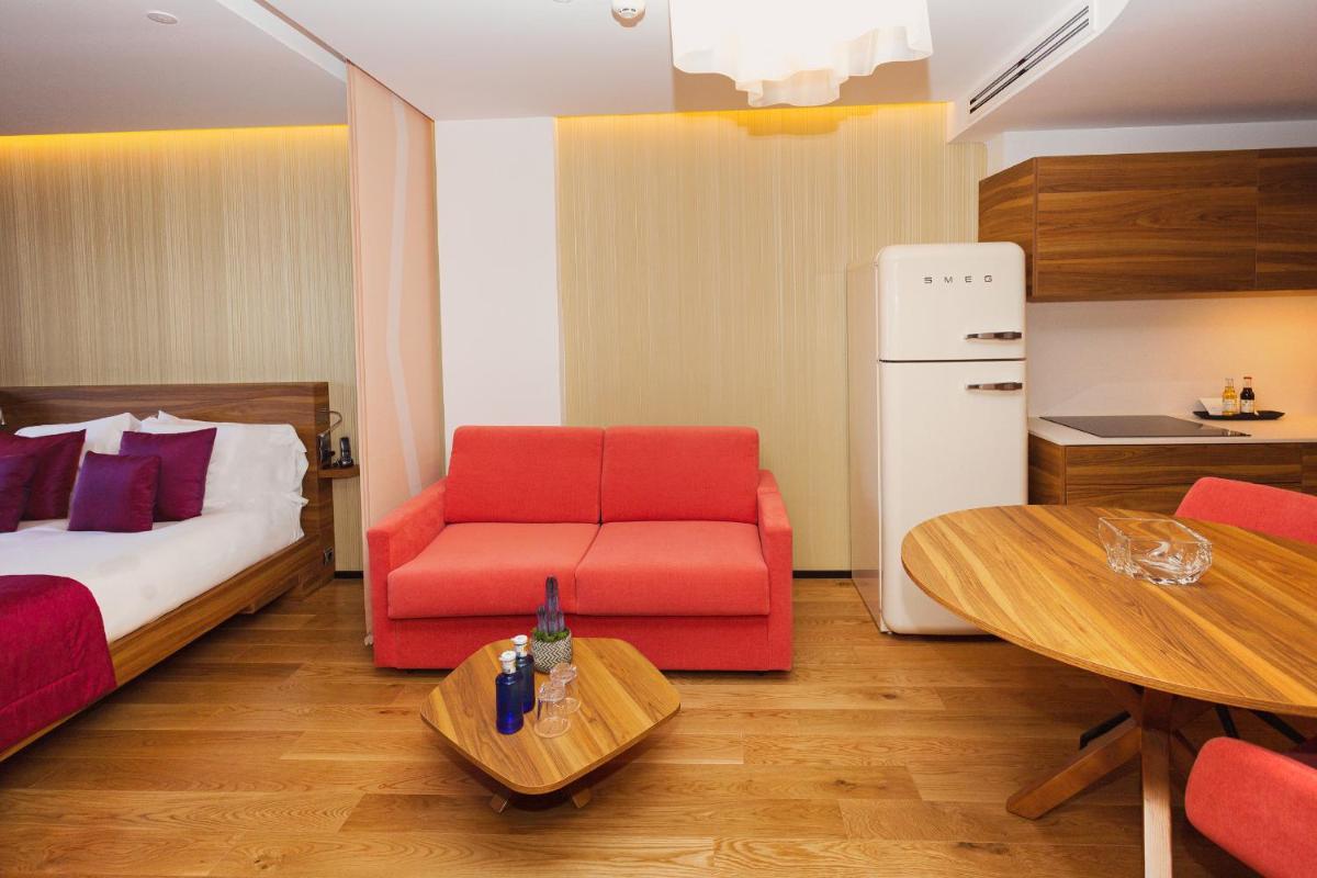 Cama o camas de una habitación en Bohemia Suites & Spa - Adults Only