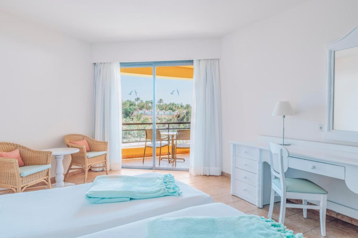 Cama o camas de una habitación en Iberostar Waves Playa Gaviotas All Inclusive