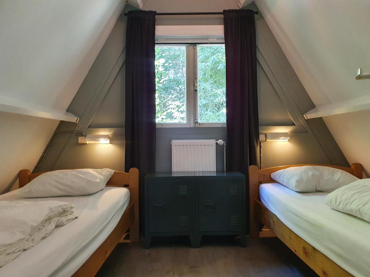 Gezellige bungalow met zwembad op het park - Housity