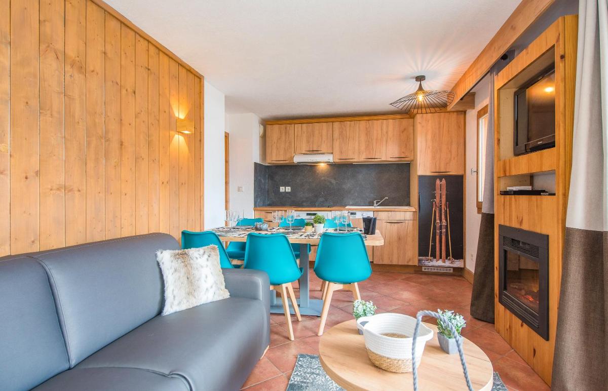 Cuisine ou kitchenette dans l'établissement Résidence Club mmv Le Hameau des Airelles ****
