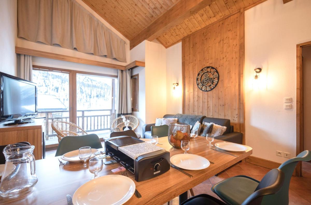Coin salon dans l'établissement Résidence Club mmv Le Hameau des Airelles ****