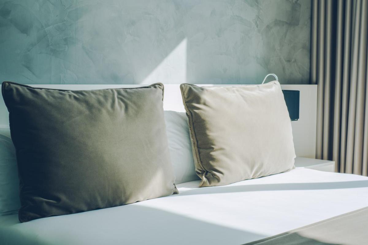 Uma cama ou camas num quarto em Iberostar Selection Lisboa