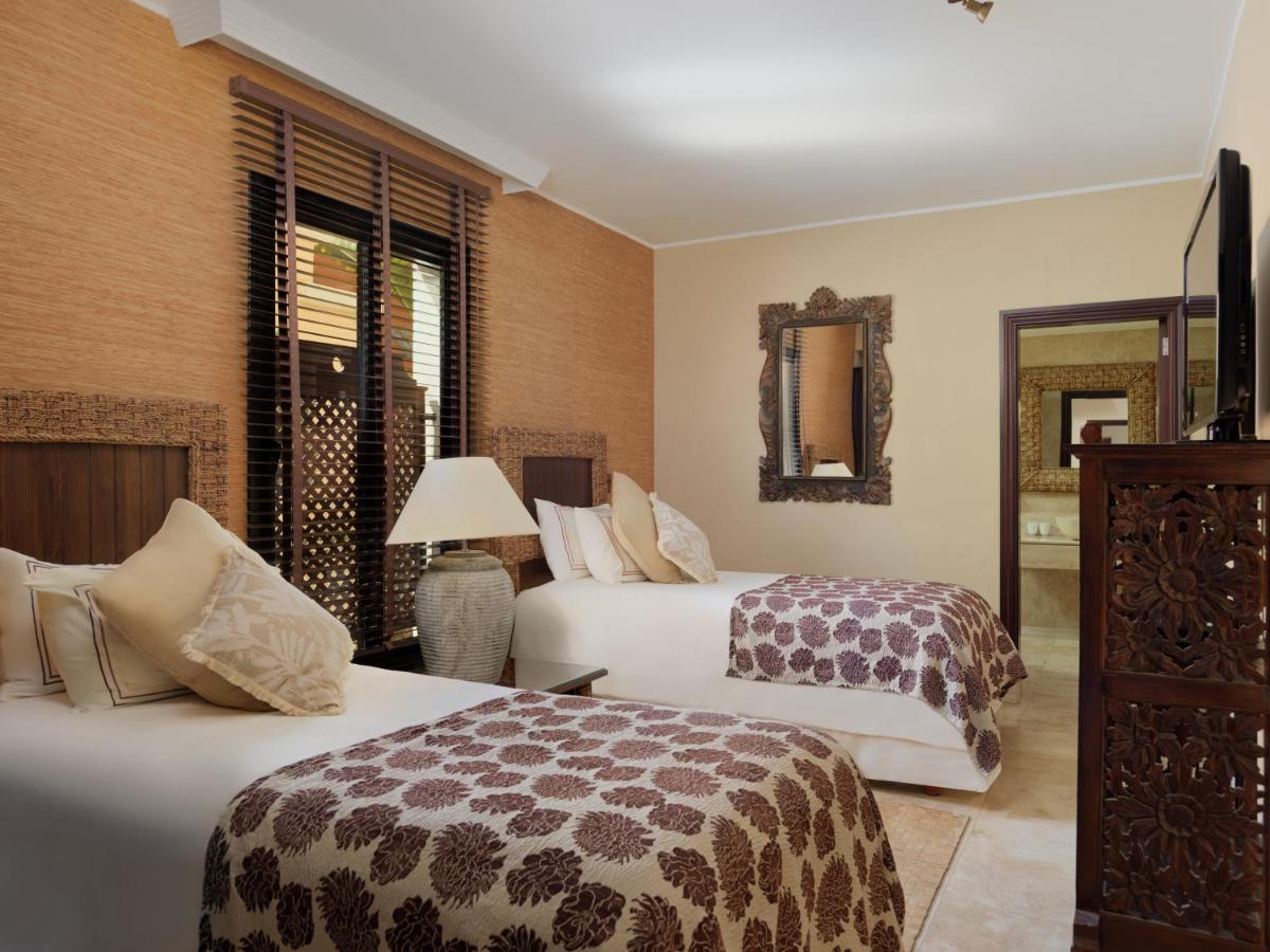 Cama o camas de una habitación en Royal Garden Villas, Luxury Hotel