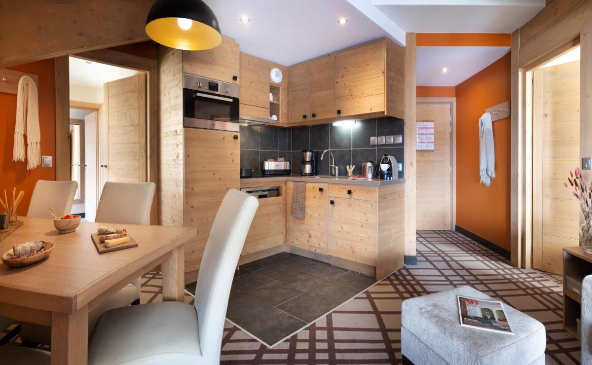 Cuisine ou kitchenette dans l'établissement Résidence Pierre & Vacances Premium Les Terrasses d'Hélios