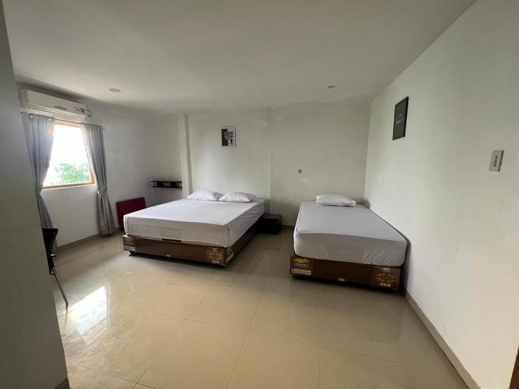 wahidin home stay - Housity