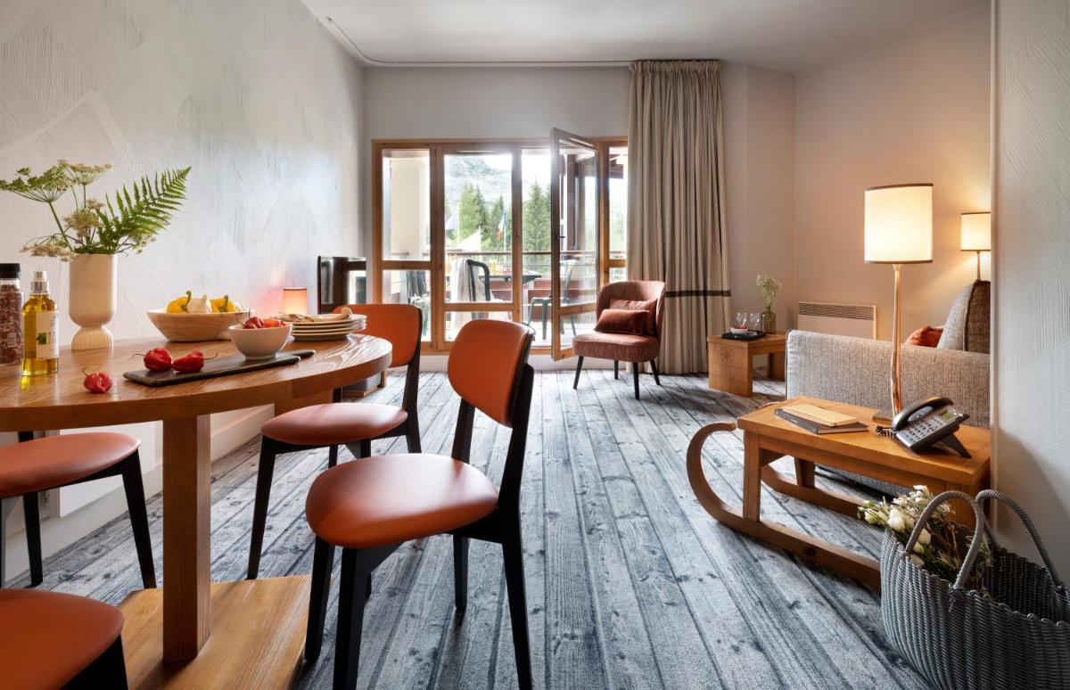 Coin salon dans l'établissement Résidence Pierre & Vacances Premium Les Terrasses d'Eos