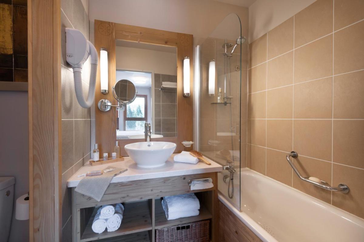Salle de bains dans l'établissement Résidence Pierre & Vacances Premium Les Terrasses d'Eos