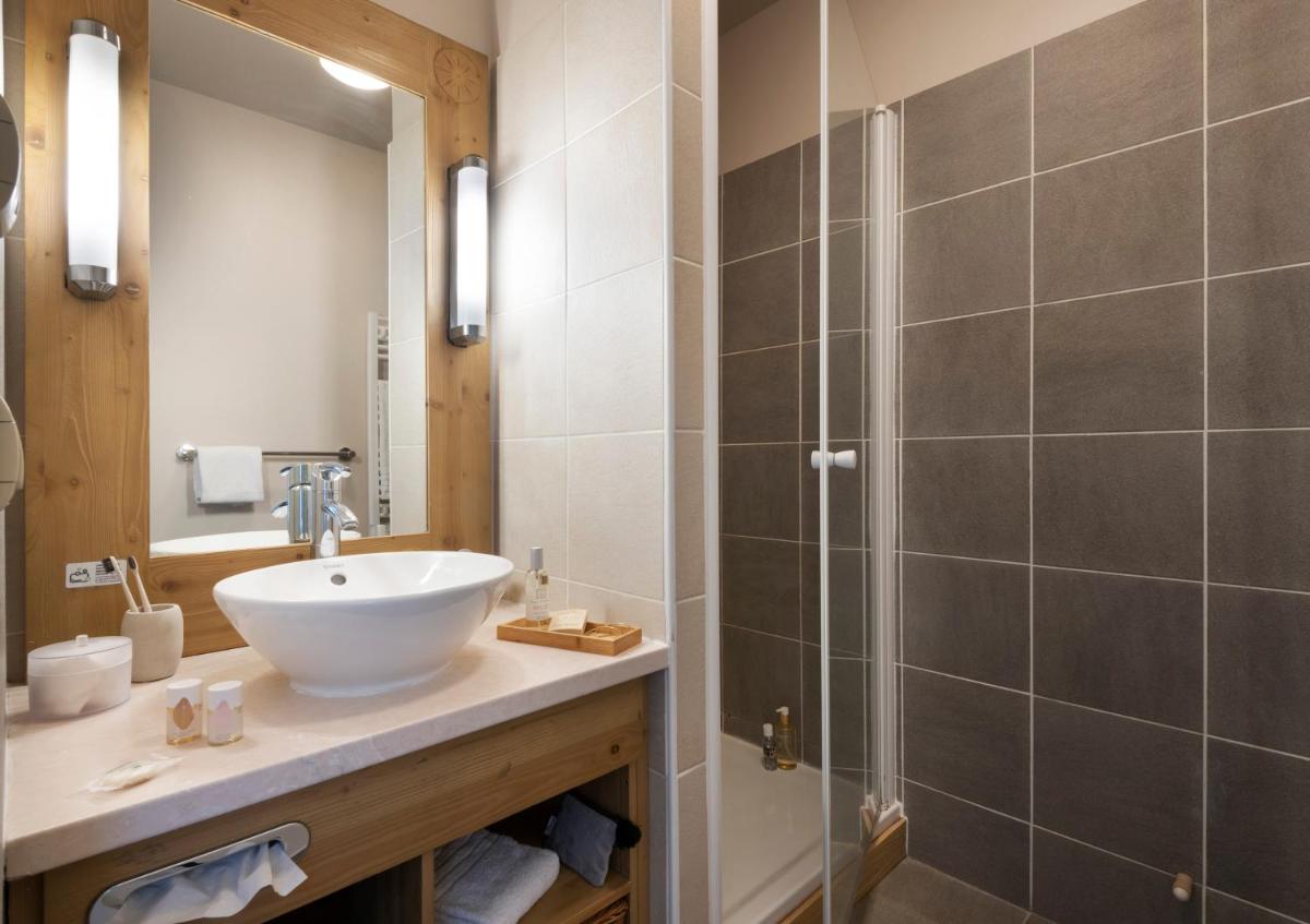 Salle de bains dans l'établissement Résidence Pierre & Vacances Premium Les Terrasses d'Eos