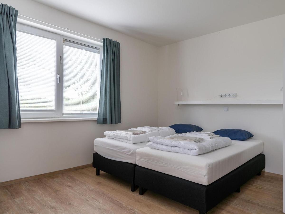 Holiday Home in Nes with garden - Housity