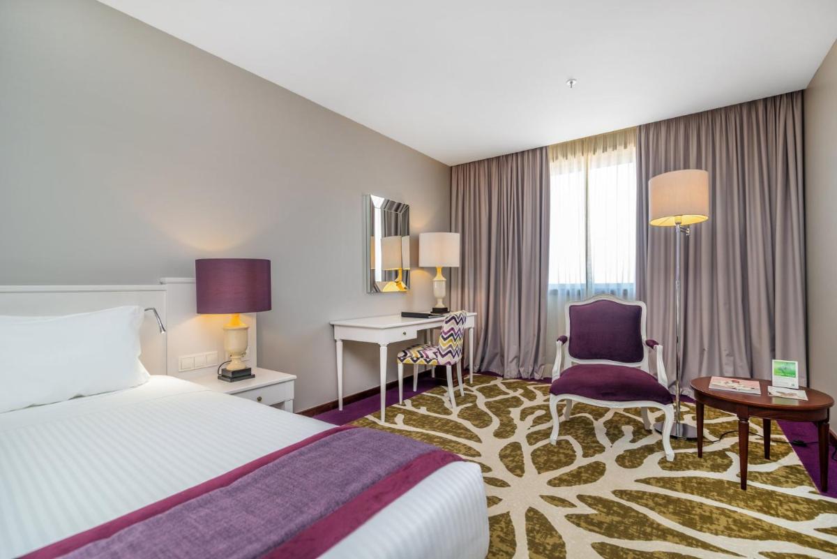 Uma cama ou camas num quarto em Holiday Inn Porto Gaia by IHG