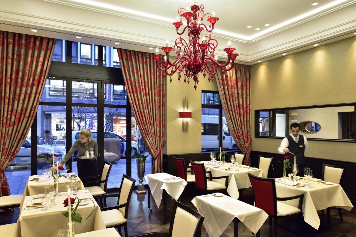 Ein Restaurant oder anderes Speiselokal in der Unterkunft Kastens Hotel Luisenhof Ein Restaurant oder anderes Speiselokal in der Unterkunft Kastens Hotel Luisenhof