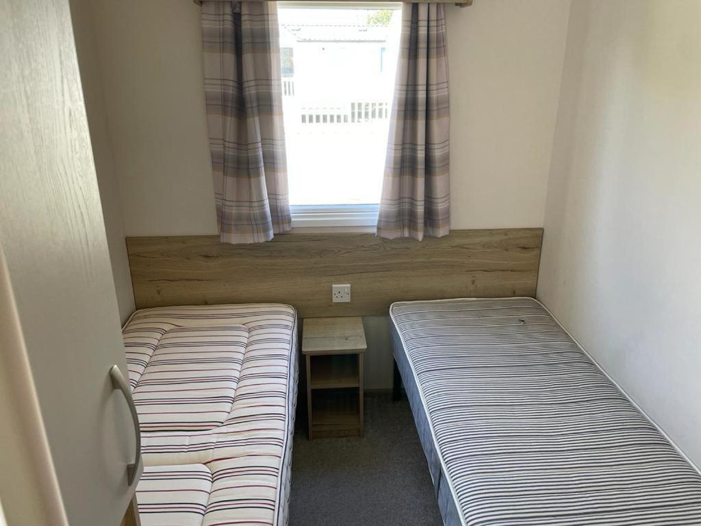 8 berth caravan with decking at Haven Golden Sands Caravan Park ref 63037I - Housity