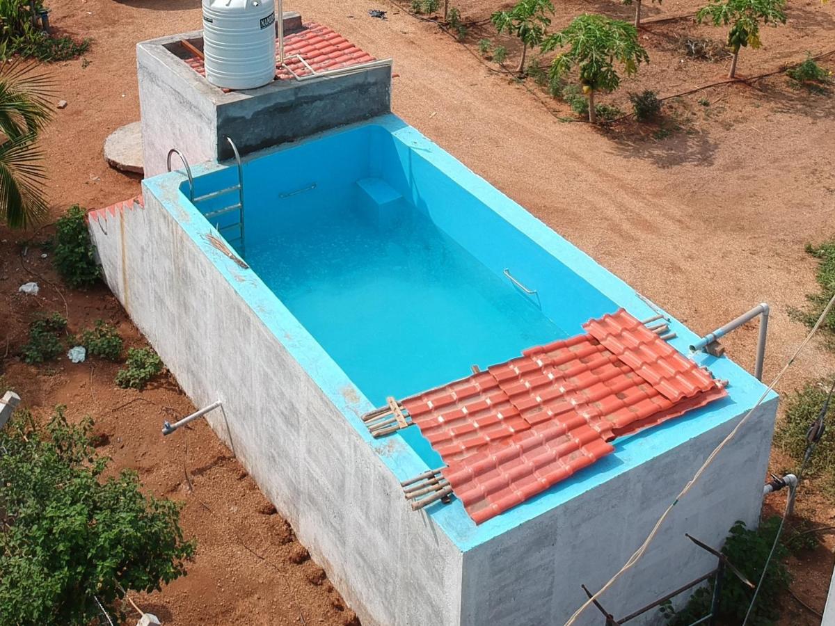 MangoHut Farmhouse Pool Villa - Housity
