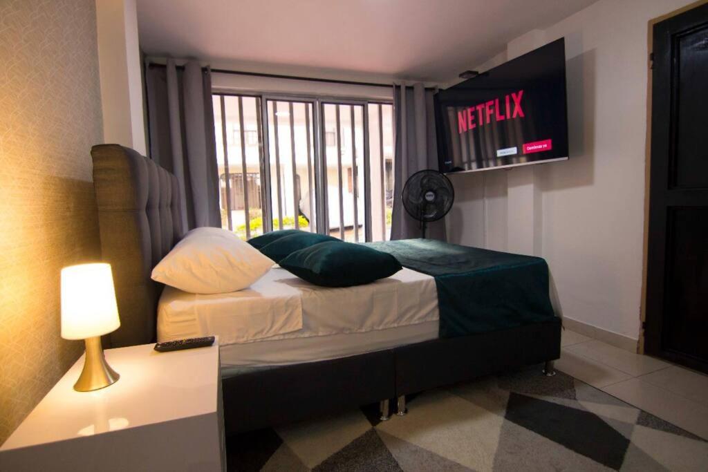 Hermoso loft, cerca al aeropuerto. - Housity