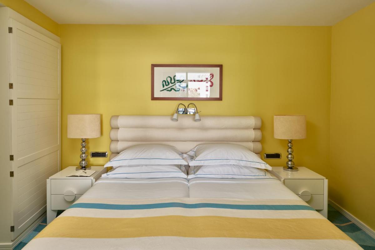 Cama o camas de una habitación en Seaside Palm Beach