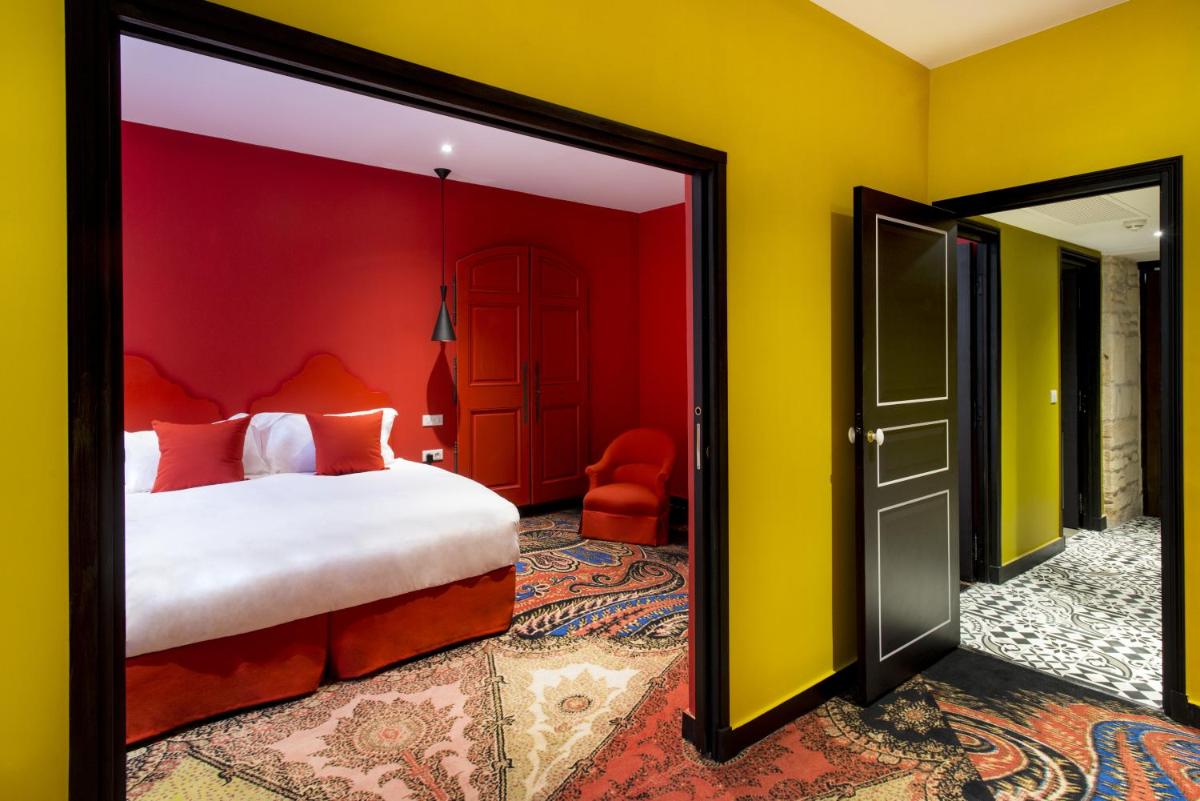 Un ou plusieurs lits dans un hébergement de l'établissement Jules César Hotel & Spa Arles - MGallery Collection