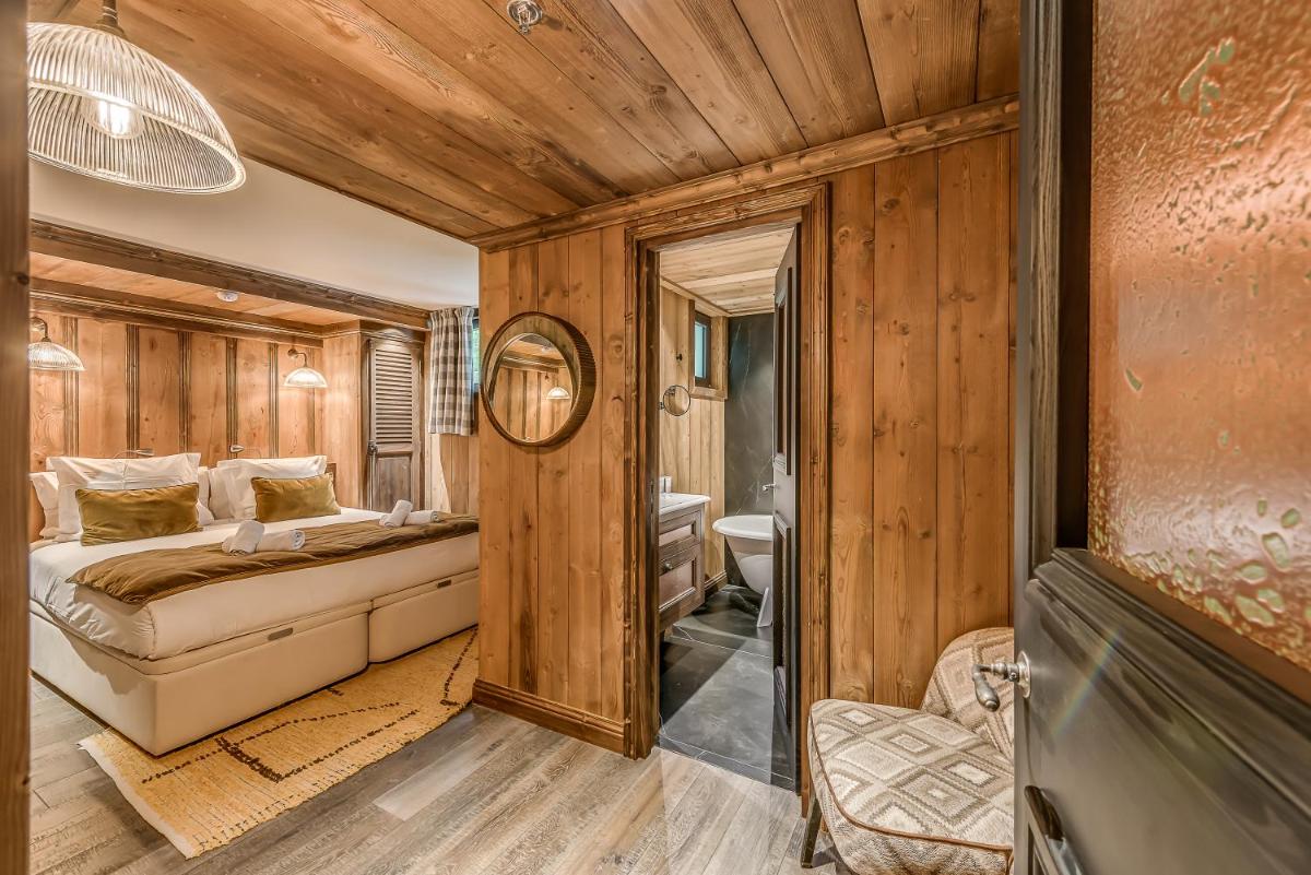 Un ou plusieurs lits dans un hébergement de l'établissement Hotel & Spa Le Val d'Isère