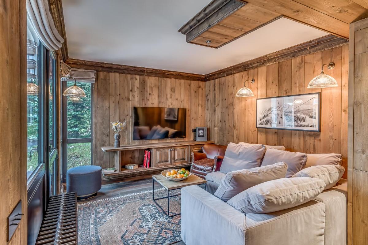 Télévision ou salle de divertissement dans l'établissement Hotel & Spa Le Val d'Isère