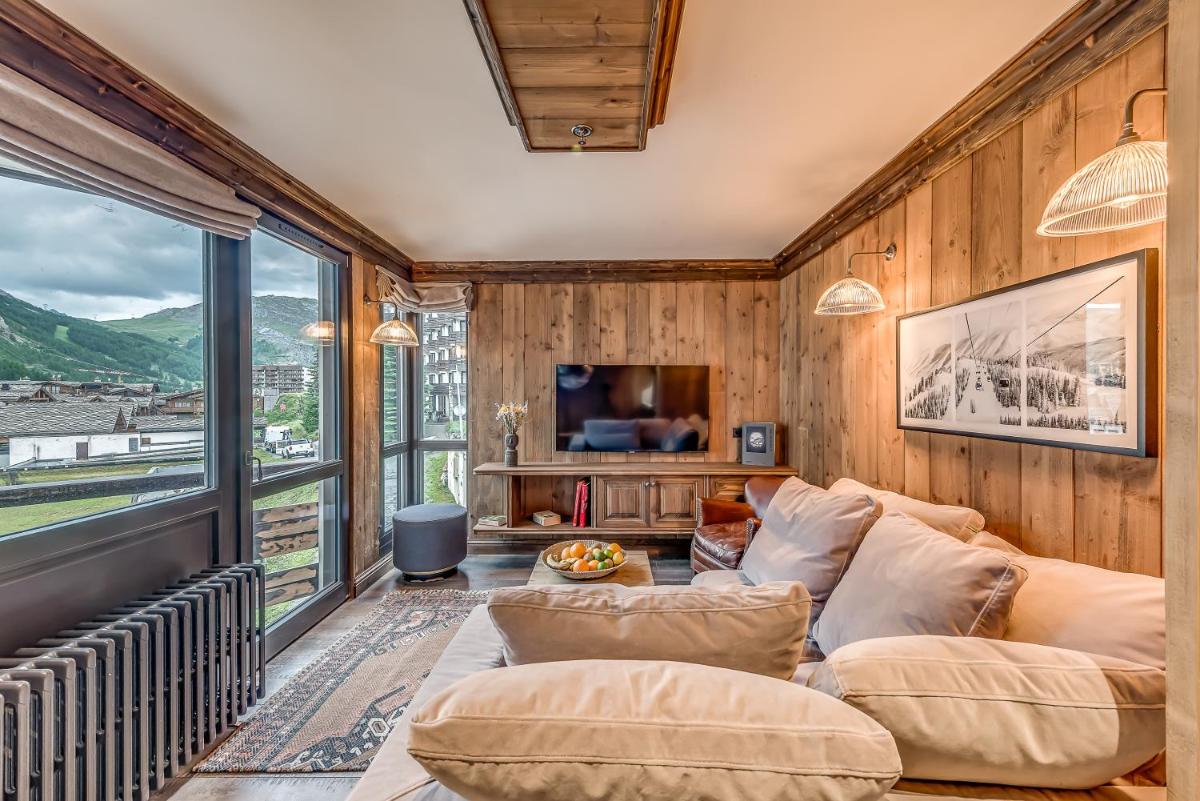 Télévision ou salle de divertissement dans l'établissement Hotel & Spa Le Val d'Isère
