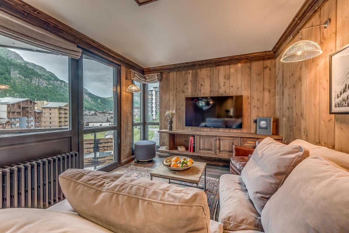 Télévision ou salle de divertissement dans l'établissement Hotel & Spa Le Val d'Isère