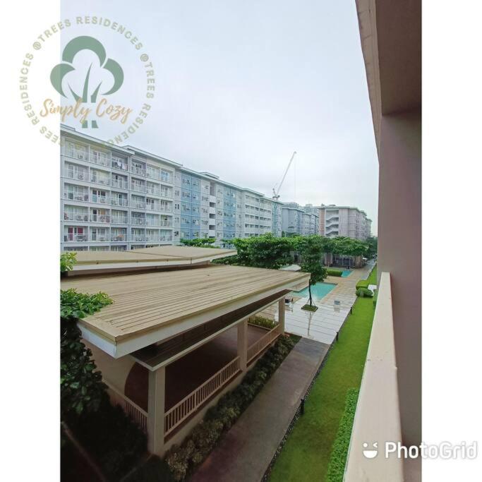 Simply COZY at Trees Residences 1 Br with Balcony - Housity