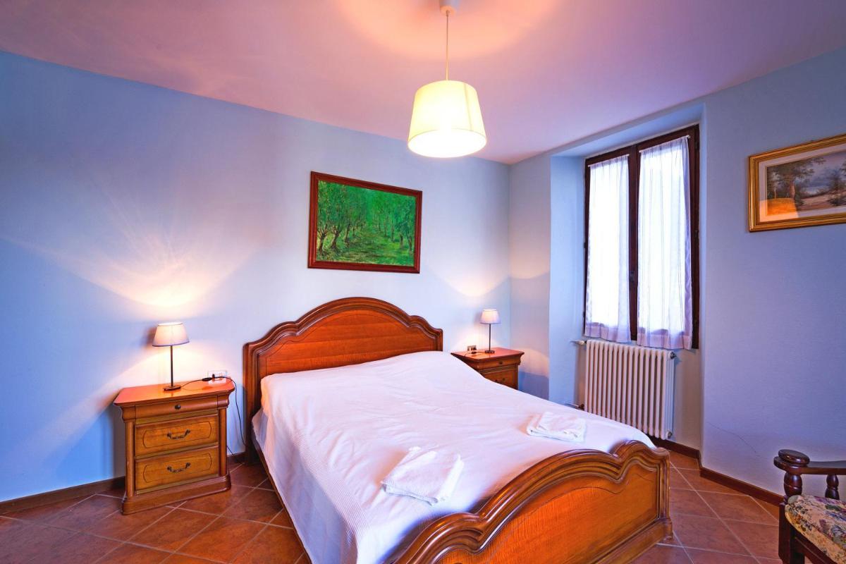 Riva di Pianello Balkon-Ferienwohnung am See (EG) - Housity