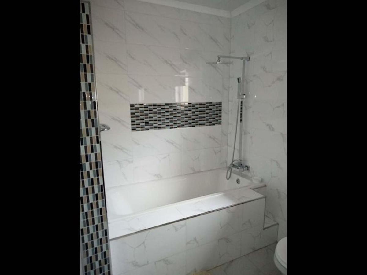 Exclusive 4 bedrooms close to university of Zambia - Housity
