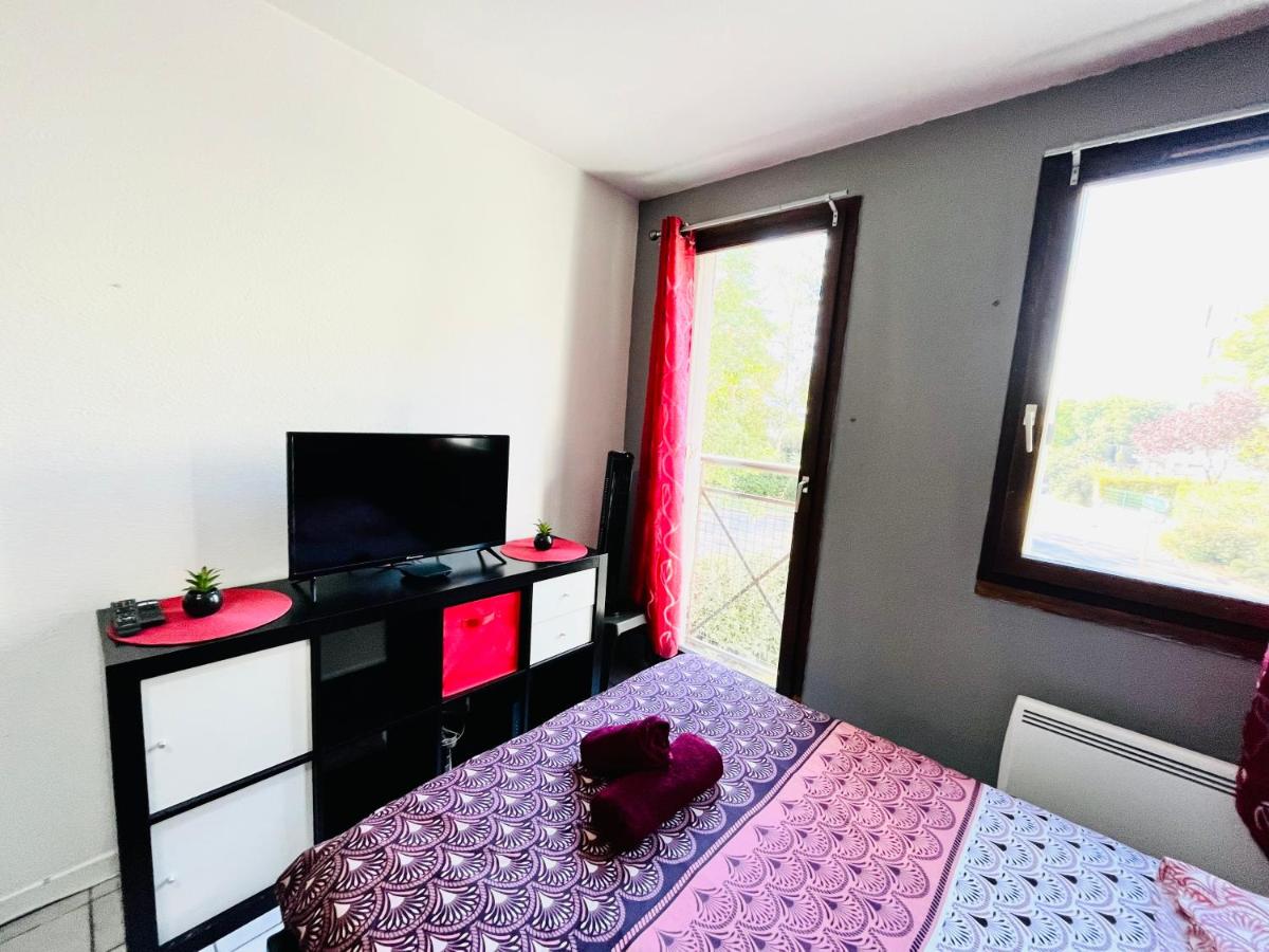 Le Red Escape à 15min du centre avec parking privé gratuit - Housity