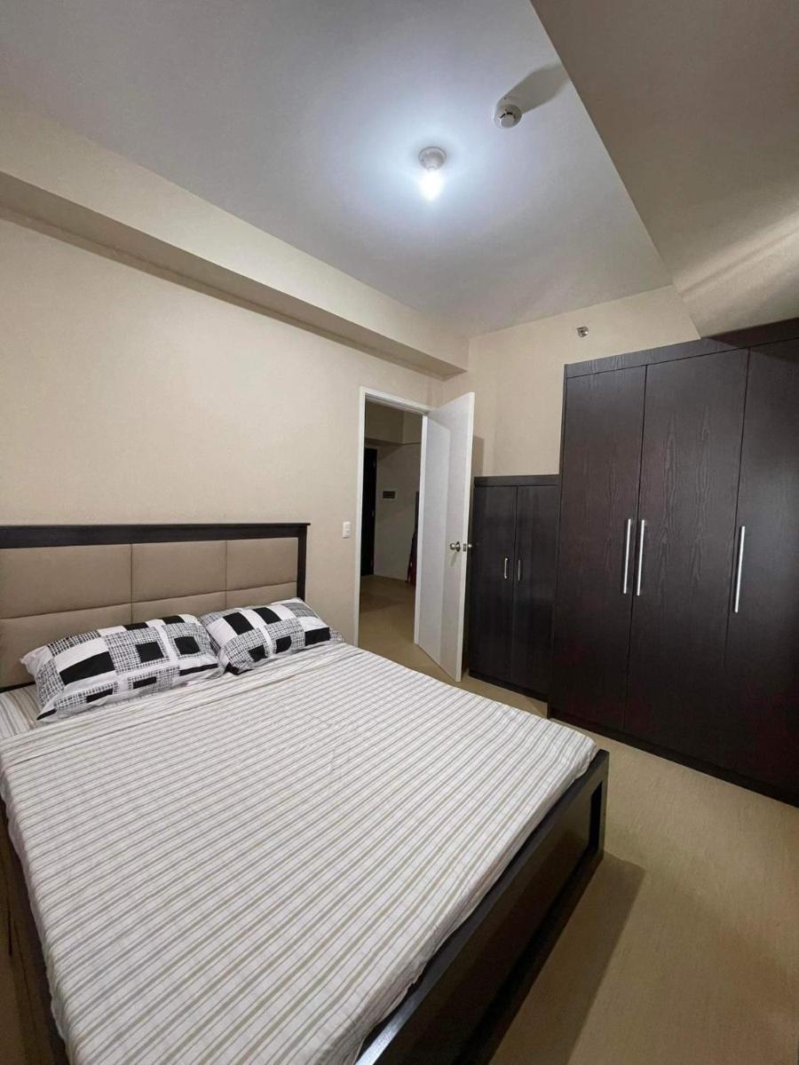 Avida Tower 1 bedroom Condo with Free parking - Housity