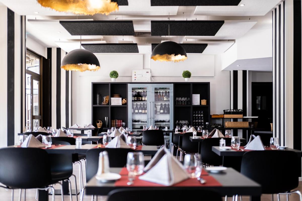 Restaurant ou autre lieu de restauration dans l'établissement Mercure Tours Sud