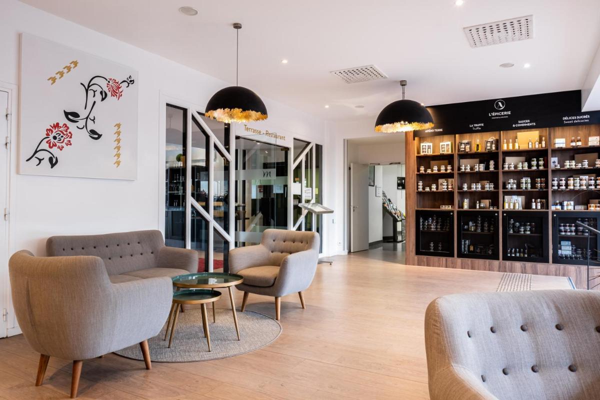 Coin salon dans l'établissement Mercure Tours Sud