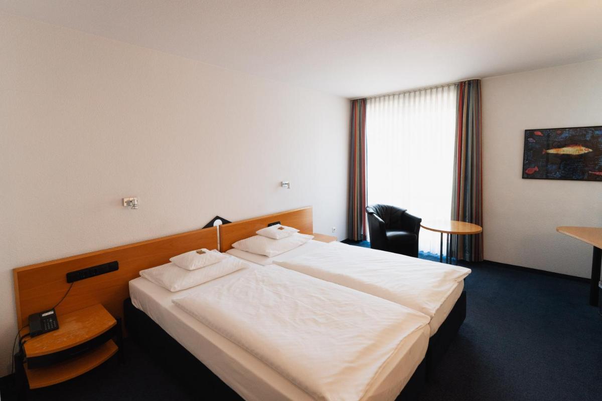 Hotel am Weiher - Housity