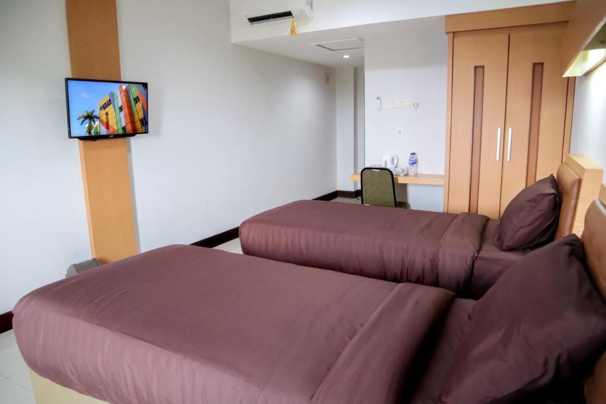 Hotel Ceria Jambi - Housity