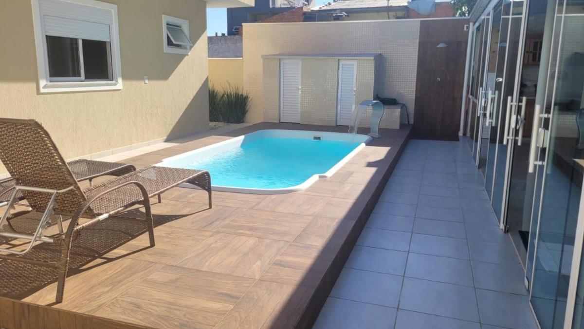 Suitetrails - Casa com piscina em condomínio fechado - Praia de Zimbros