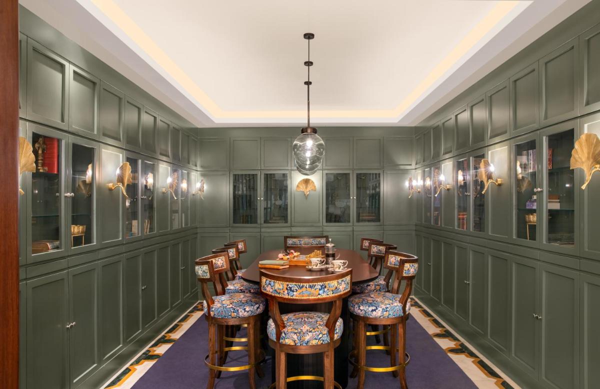 a dining room with a table and chairs at Tajview, Agra-IHCL SeleQtions in Agra