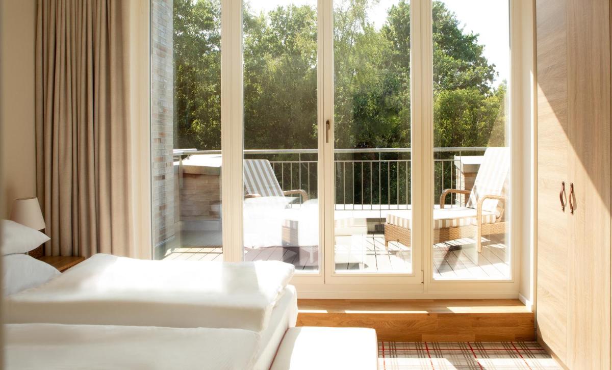 Ein Balkon oder eine Terrasse in der Unterkunft Aalernhüs hotel & spa