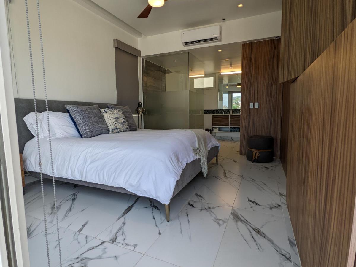 Romantic home with Stunning Rooftop pool and Jacuzzi in PV by Alterhome - Housity
