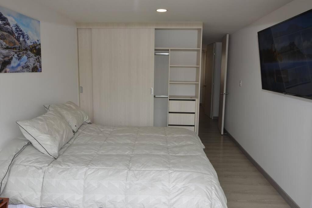 Hermoso apartamento en Paipa con vista al lago Sochagota. - Housity