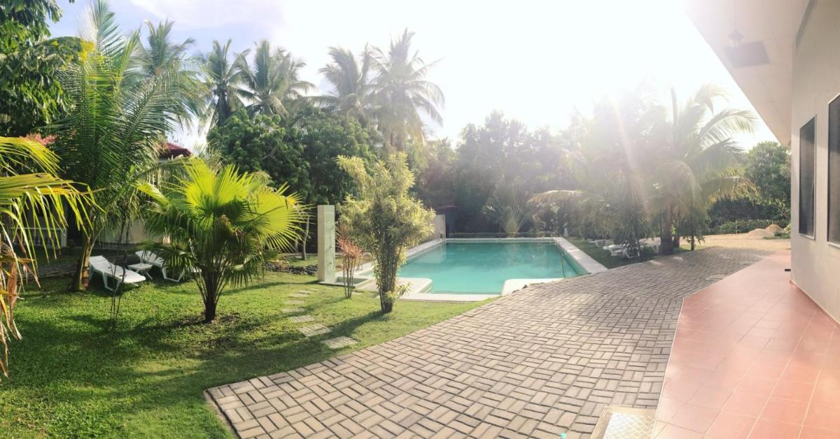 Meili Beach Resort - Housity