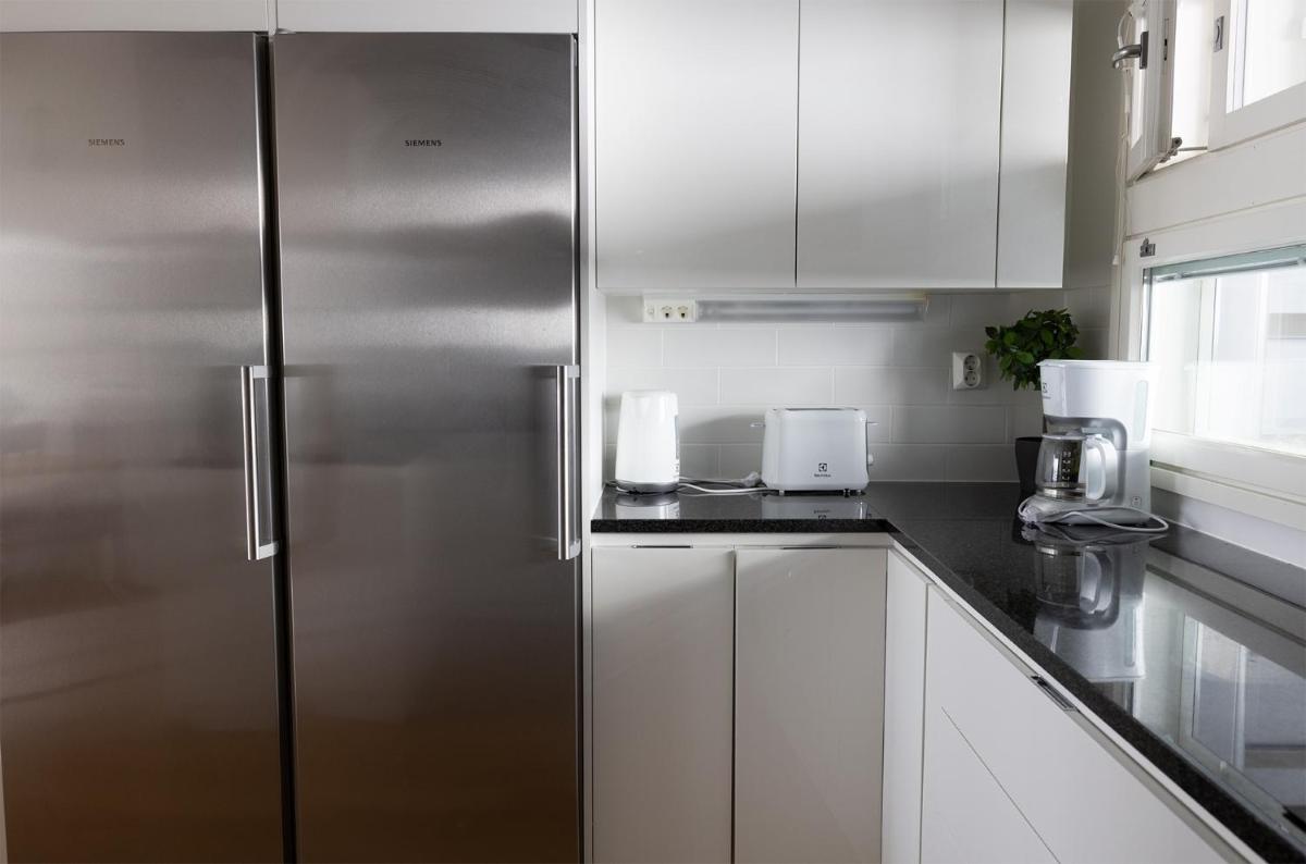 2ndhomes Gorgeous 3BR Apartment in 2 floors with Sauna and Balcony by Central Station - Housity