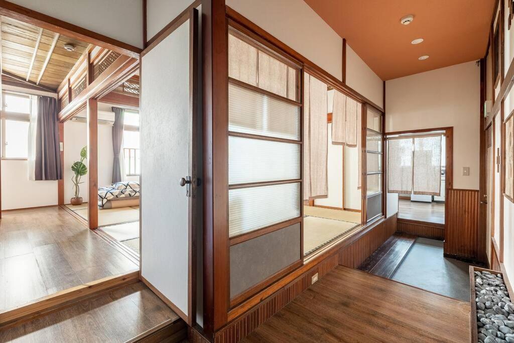 2フロア貸切最大15名 国際通り徒歩1分 駐車場1台無料 Paradise inn 安里 - Housity