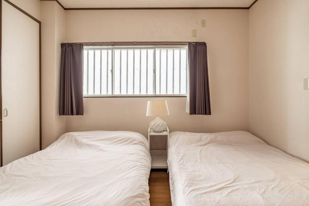 2フロア貸切最大15名 国際通り徒歩1分 駐車場1台無料 Paradise inn 安里 - Housity