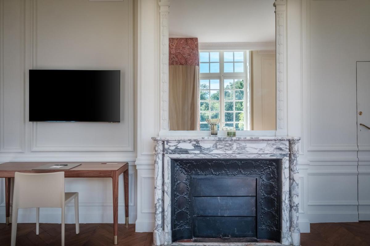 Télévision ou salle de divertissement dans l'établissement La Borde en Sologne Château & Spa