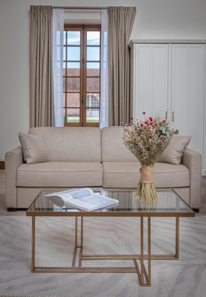 Coin salon dans l'établissement La Borde en Sologne Château & Spa
