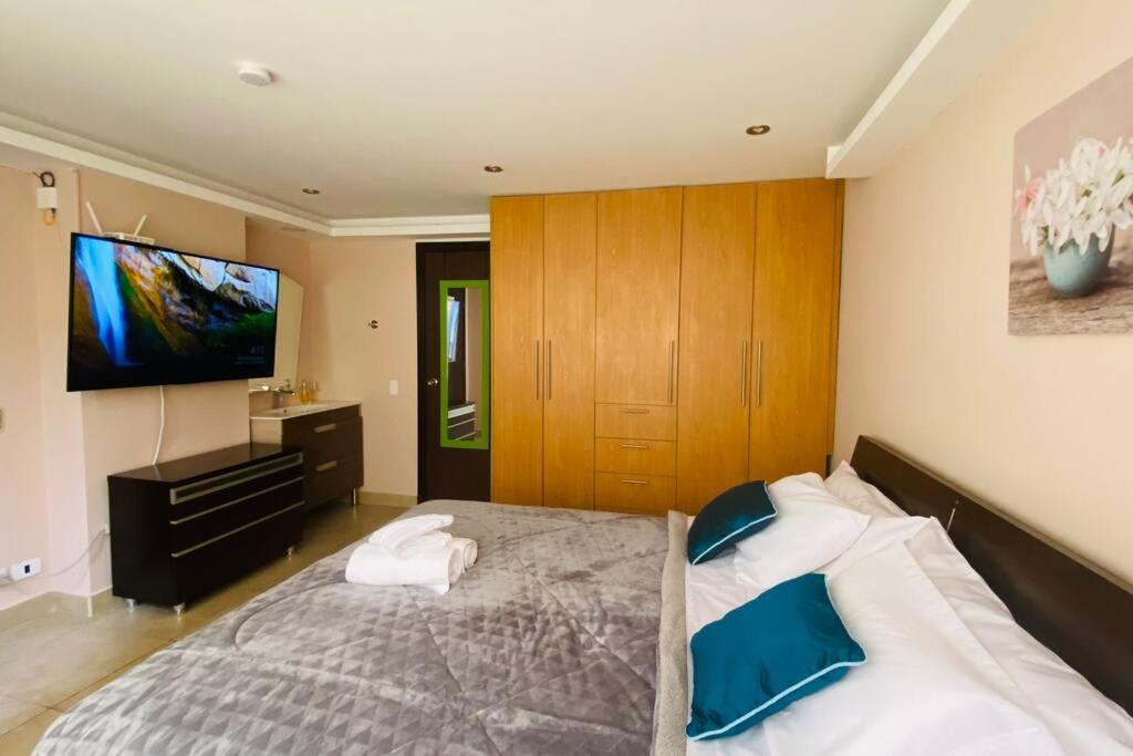 Cálida Suite La Carolina Quito - Housity