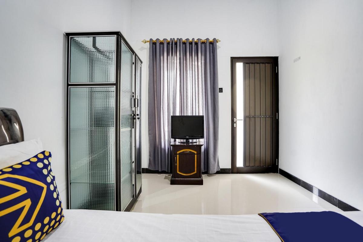 SPOT ON 91745 Rumah Kost Gresik Syariah - Hizvo