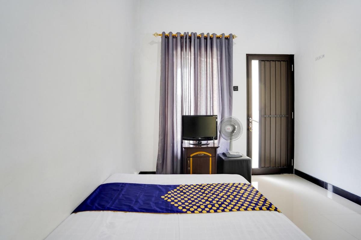 SPOT ON 91745 Rumah Kost Gresik Syariah - Hizvo